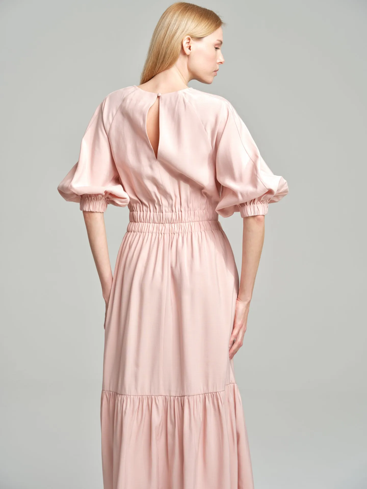 Volume dress with smocked waistline