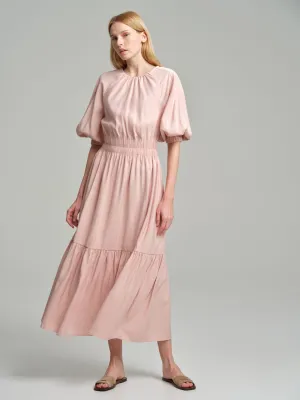 Volume dress with smocked waistline
